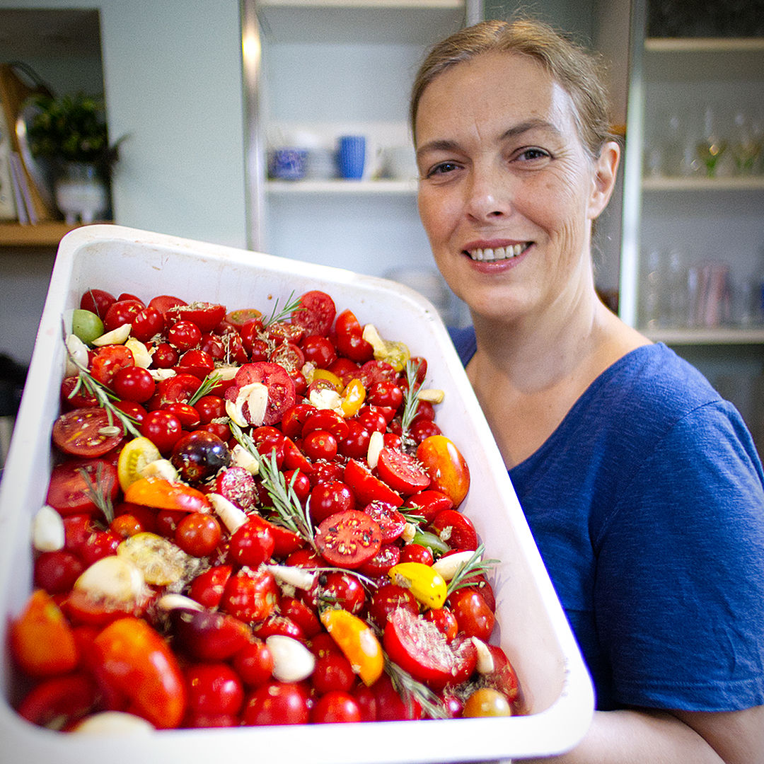 world of chillies tomatoes in tray ready for roasting